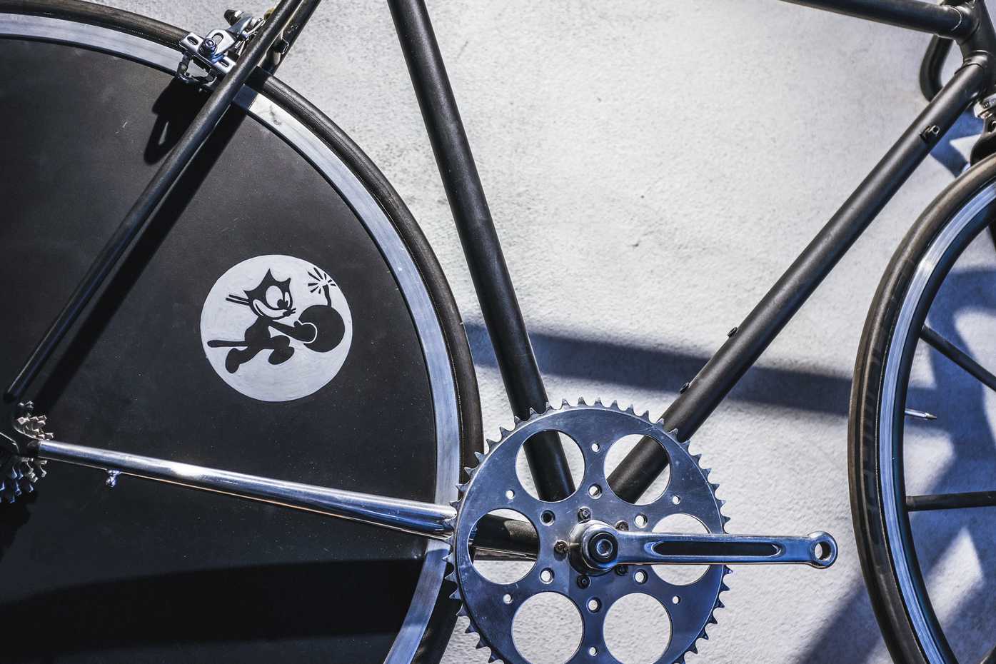 A bike decorated with a decal of Felix the Cat